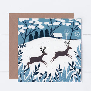Snowy Deer Cottage Greeting Card