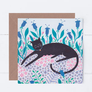 Cat Among Flowers Greeting Card